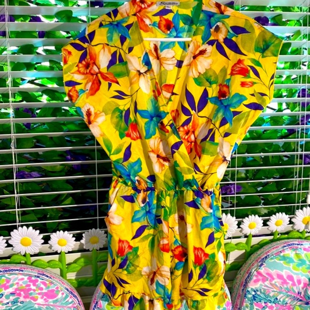 Stillettos bright yellow floral romper with ruffle hem & pockets